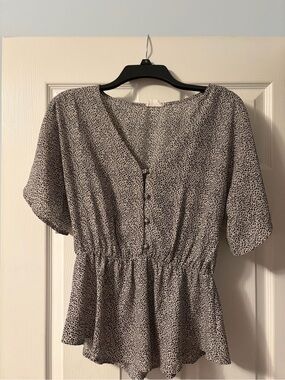 Women's Black and White Printed Peplum Blouse